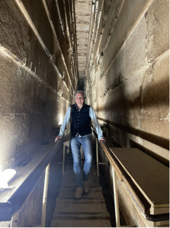 Person in Grand Gallery corridor