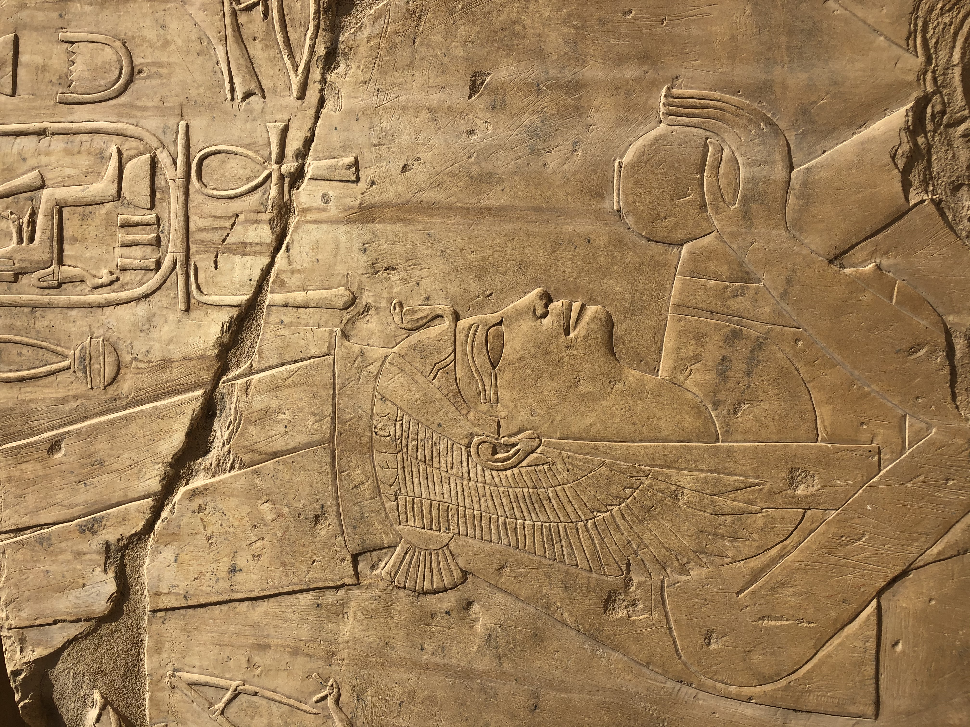 Seated figure relief