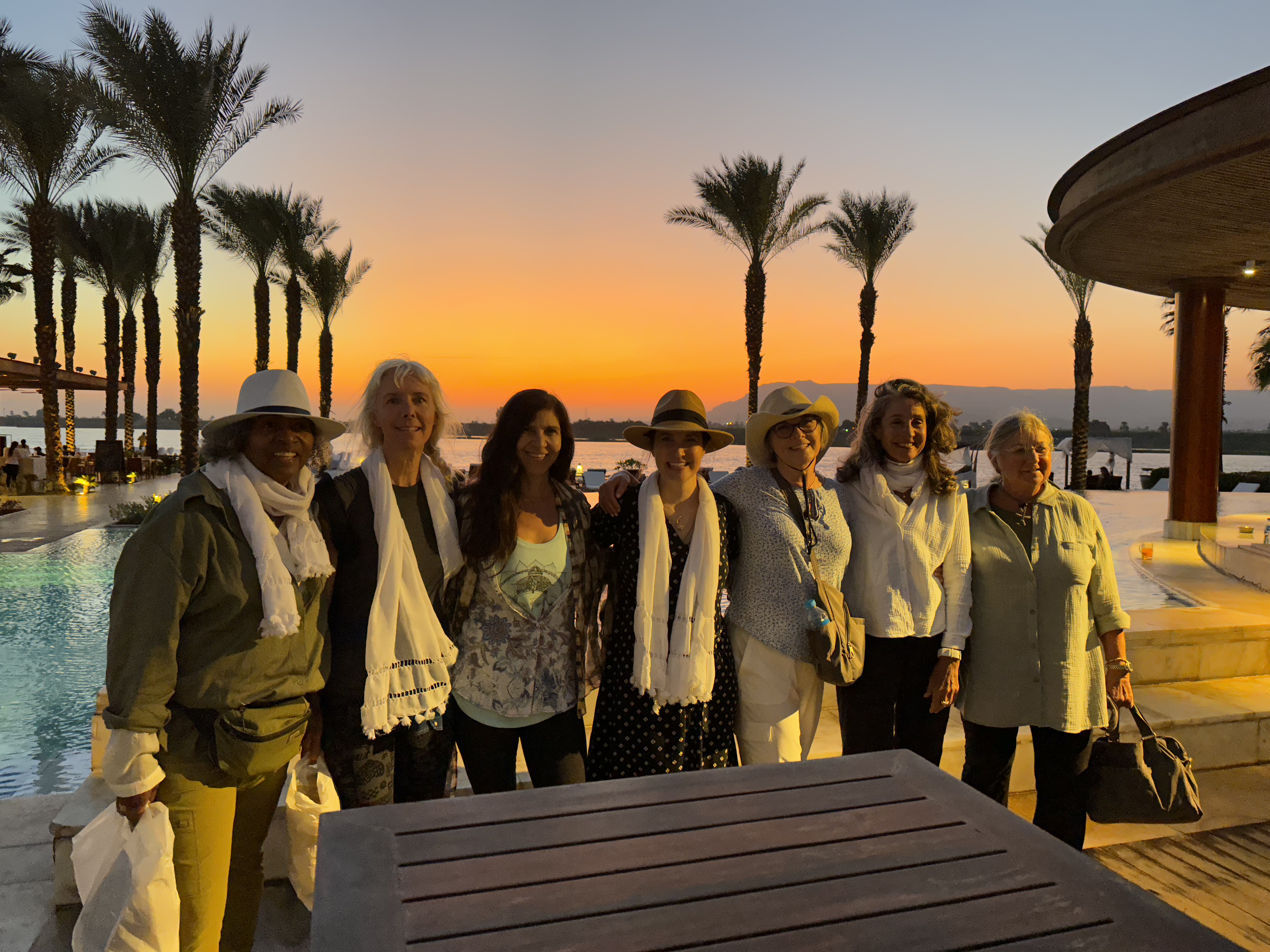 Group at sunset by pool