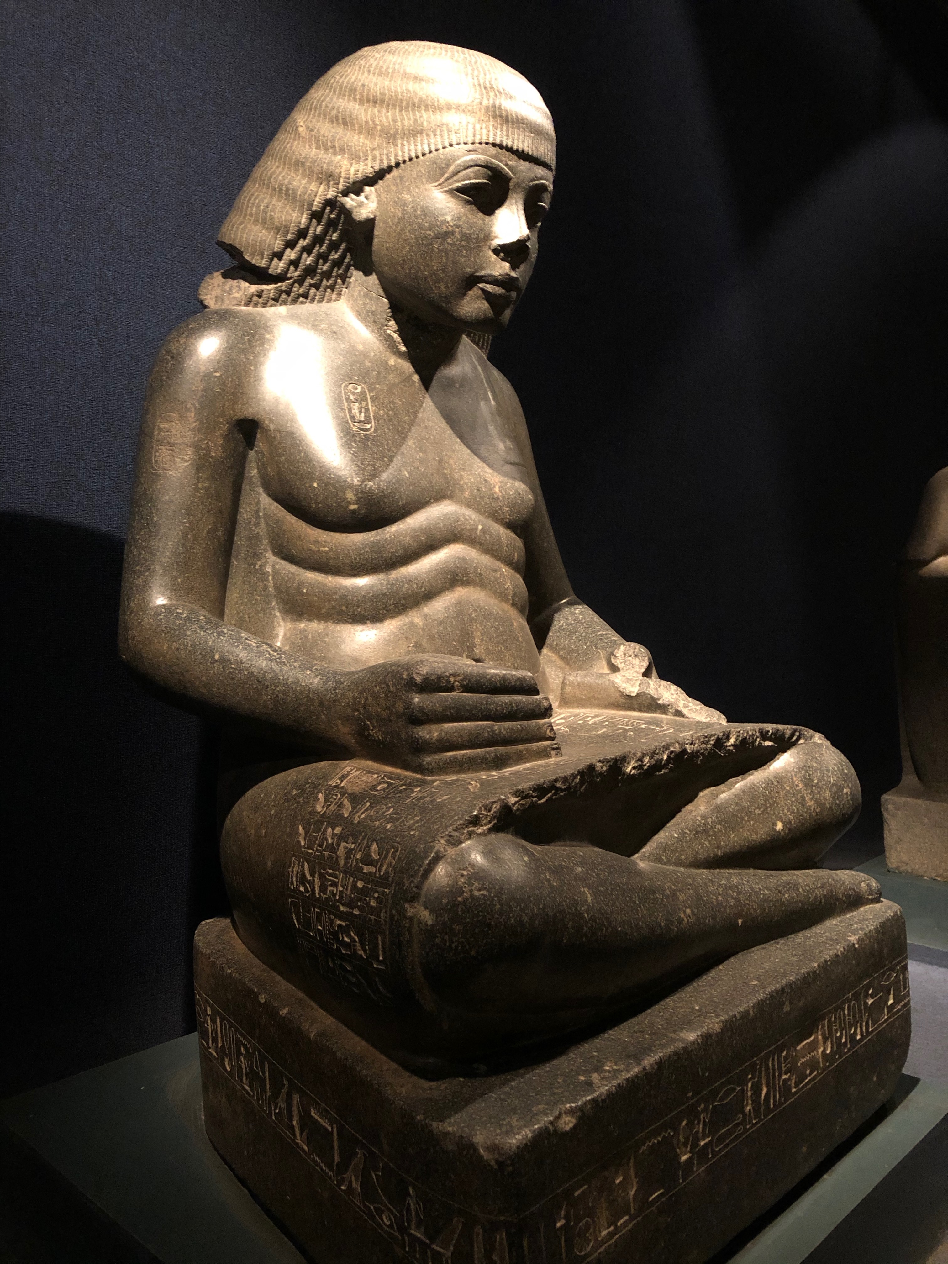 Seated Amenhotep statue in museum