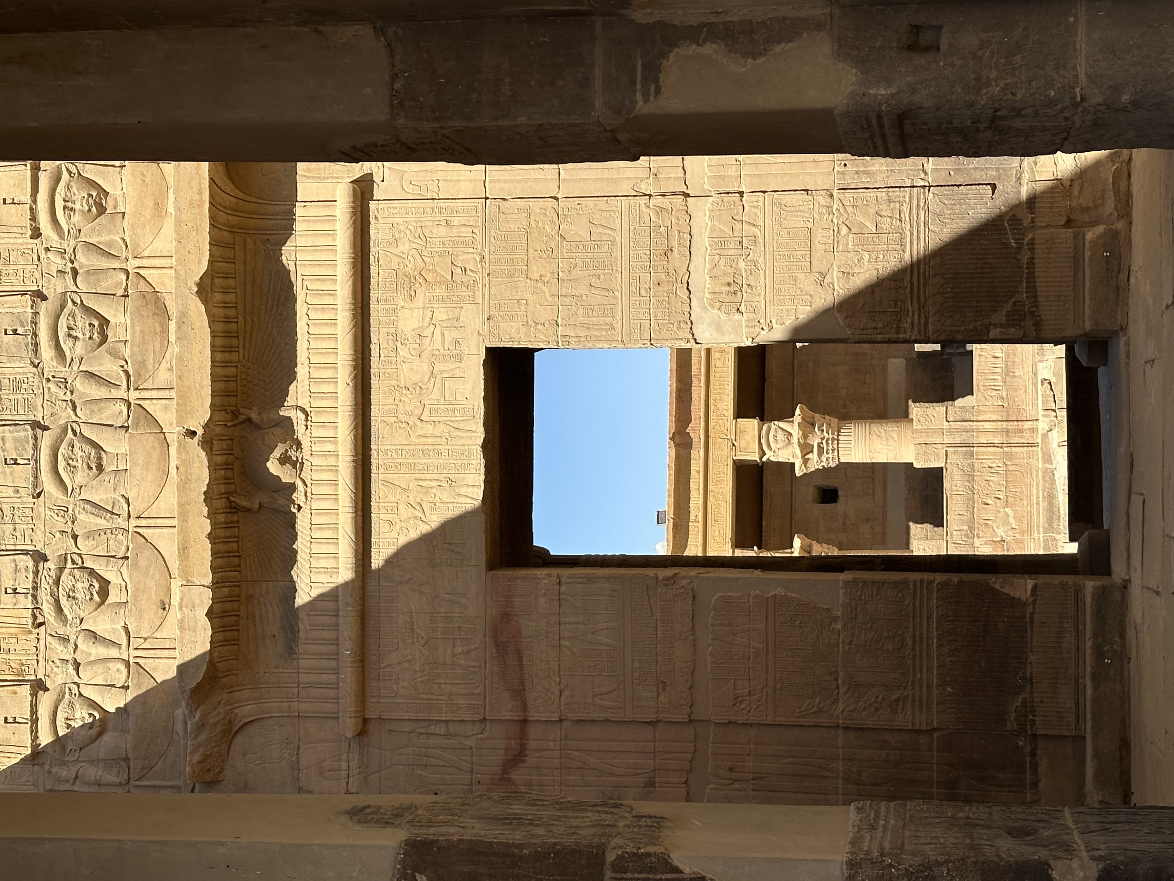 Temple doorway with Hathor heads at top